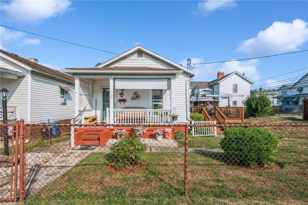 a front view of a house with patio