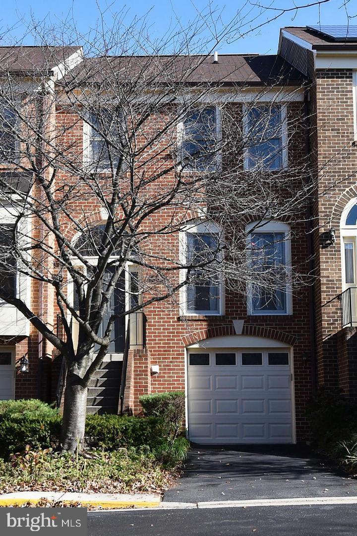 a view of a building with a tree