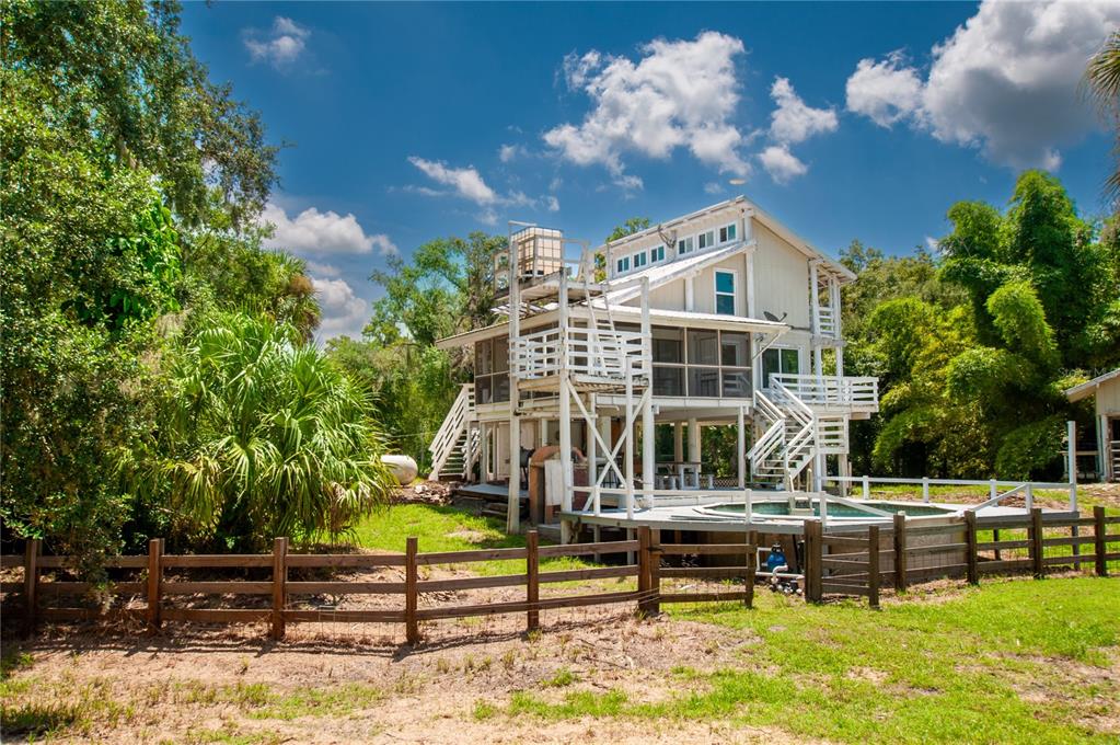 a front view of a house with swimming pool