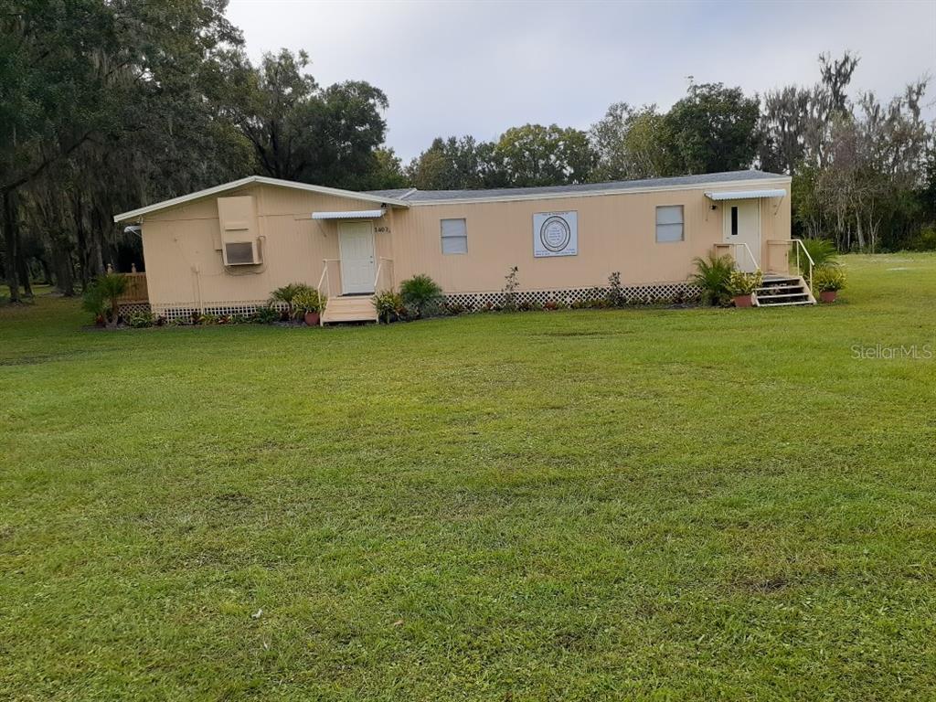 a view of a backyard of house