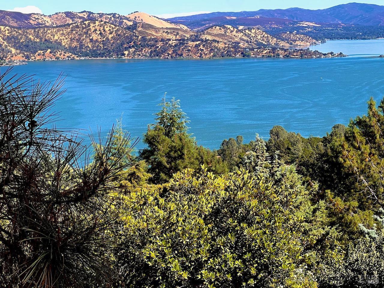 a view of a lake with mountains in the background