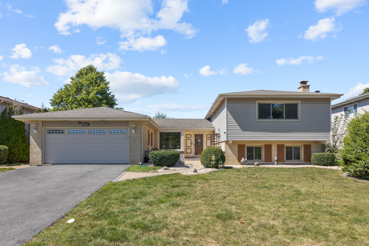 a front view of house with yard