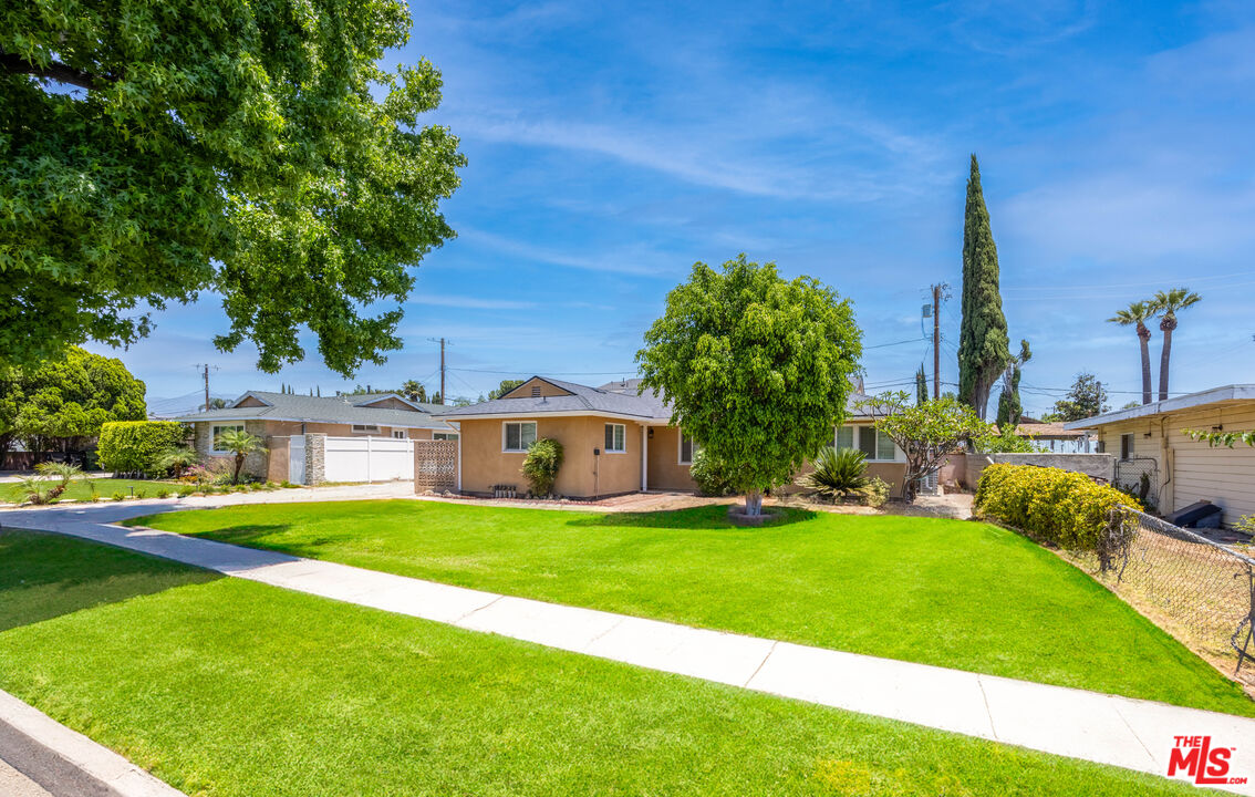 a view of a house with a big yard