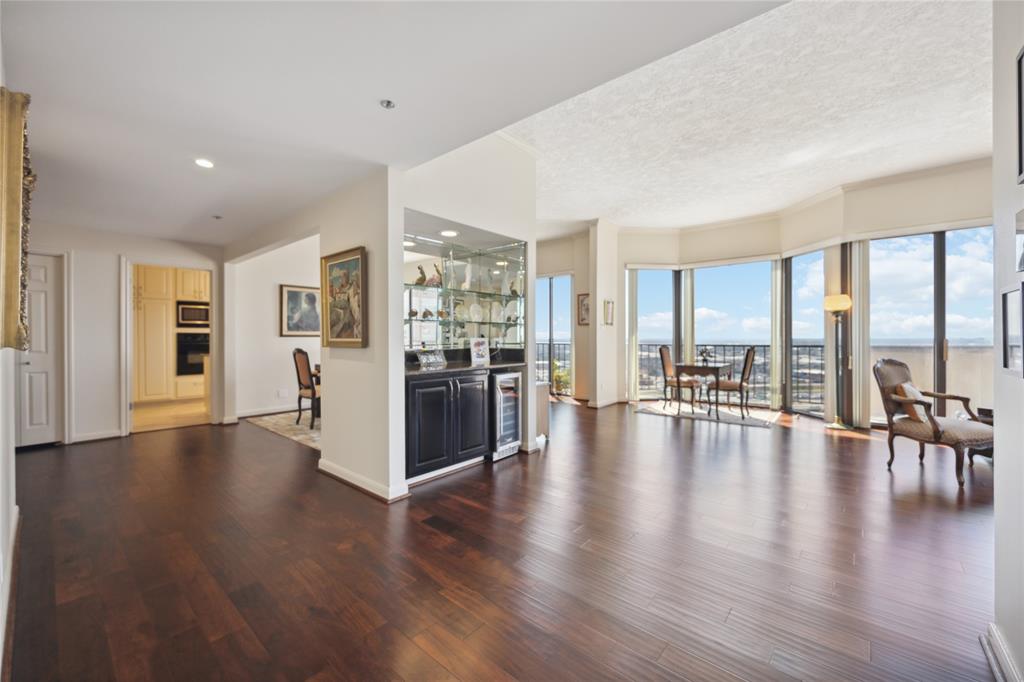 a view of dining room with furniture and wooden floor