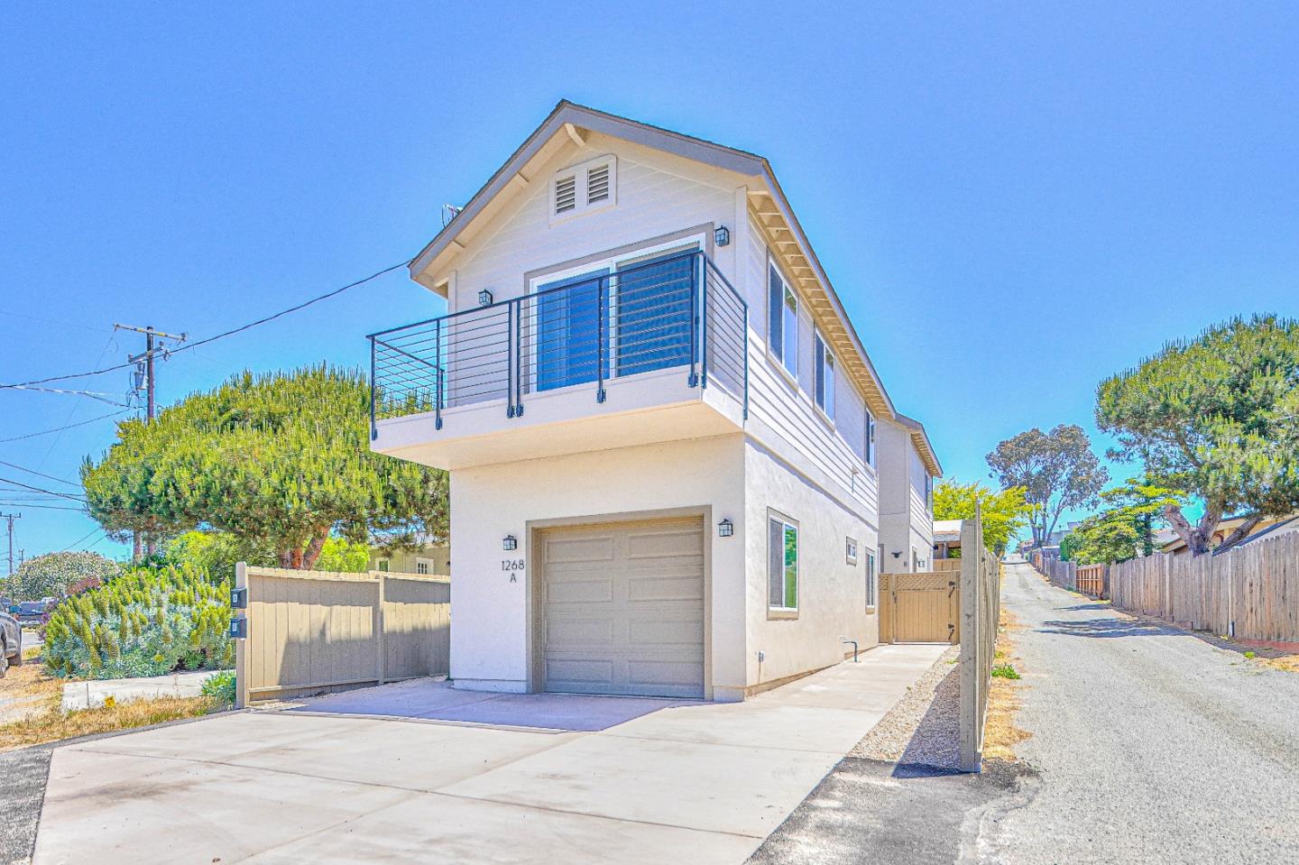 a front view of a house with a garage