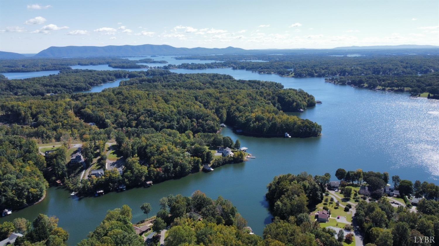 an aerial view of lake and mountain view