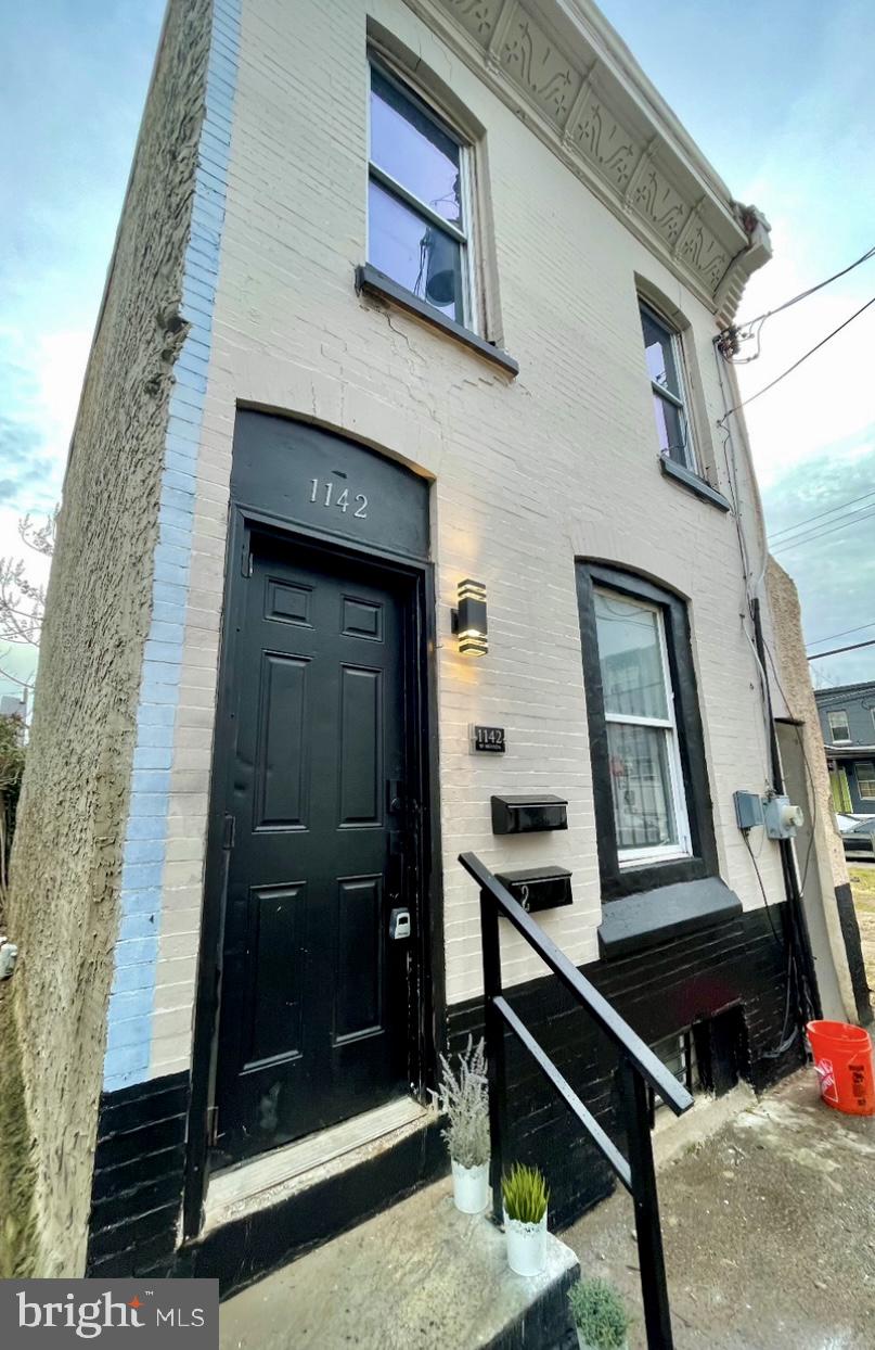 a front view of a house with a window