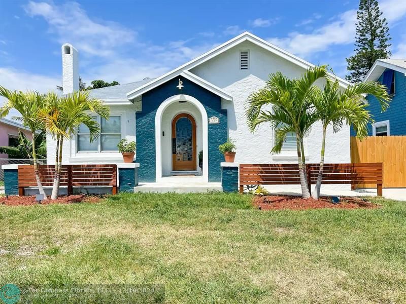 a house view with a garden space