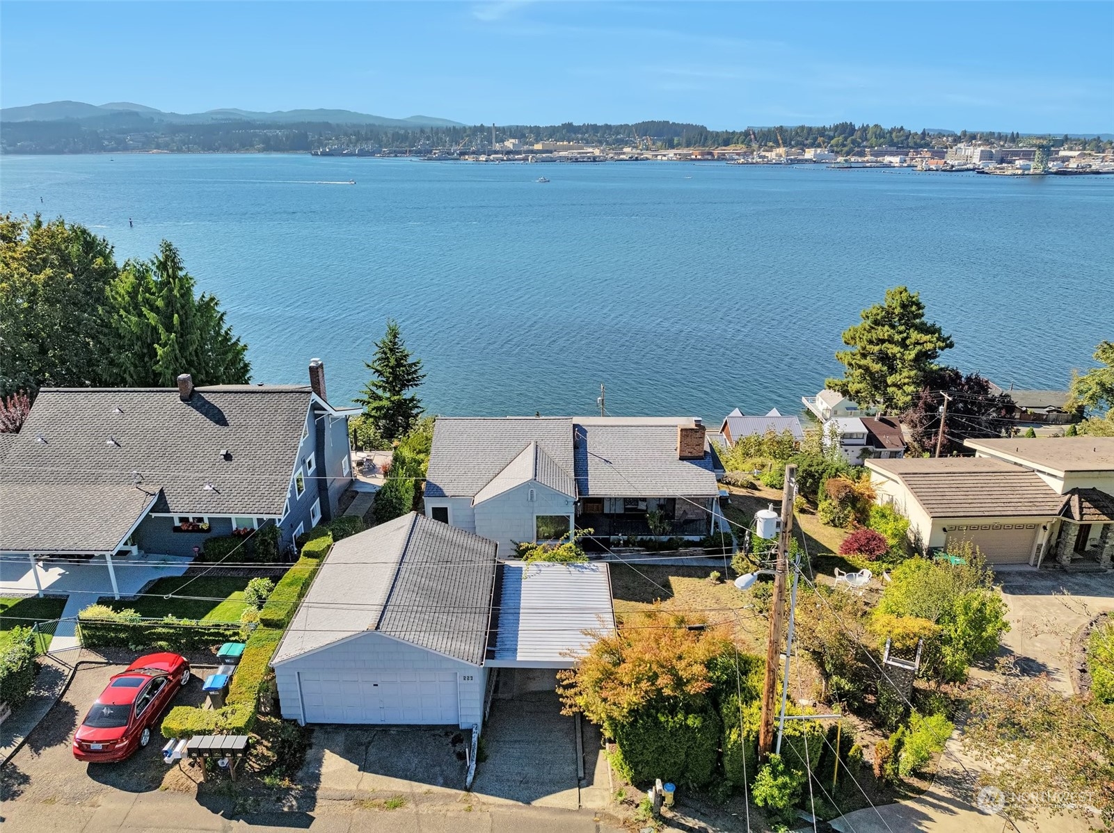 a aerial view of a house with a lake view