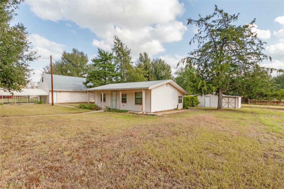 a house with trees in front of it