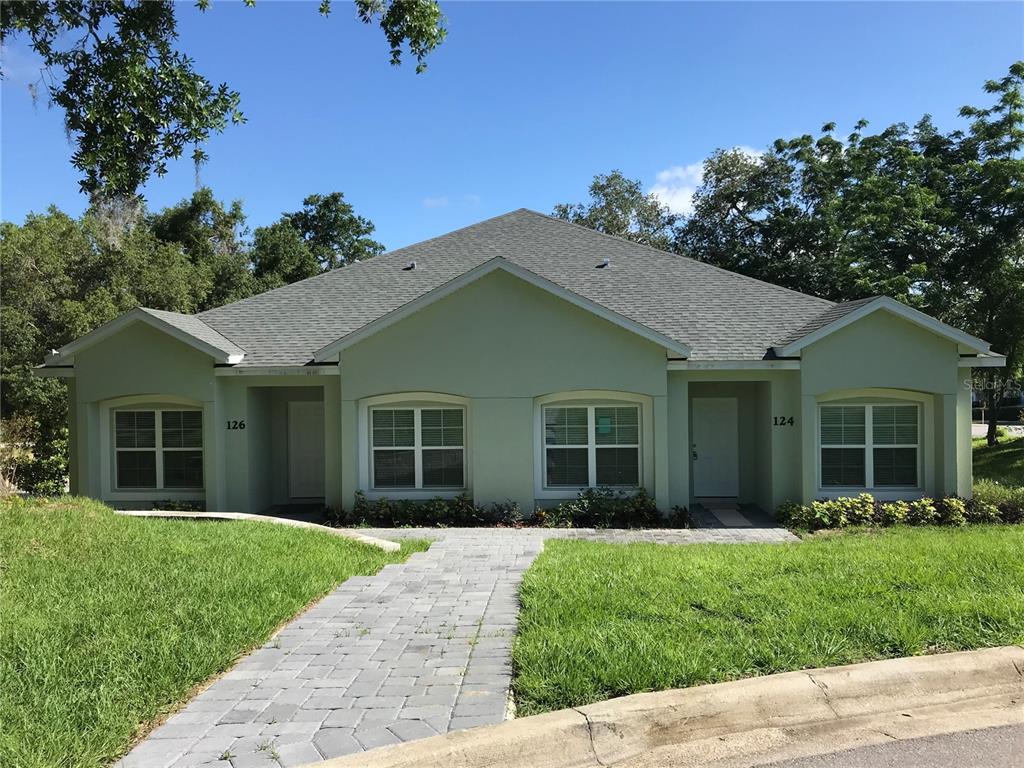 front view of a house with a yard