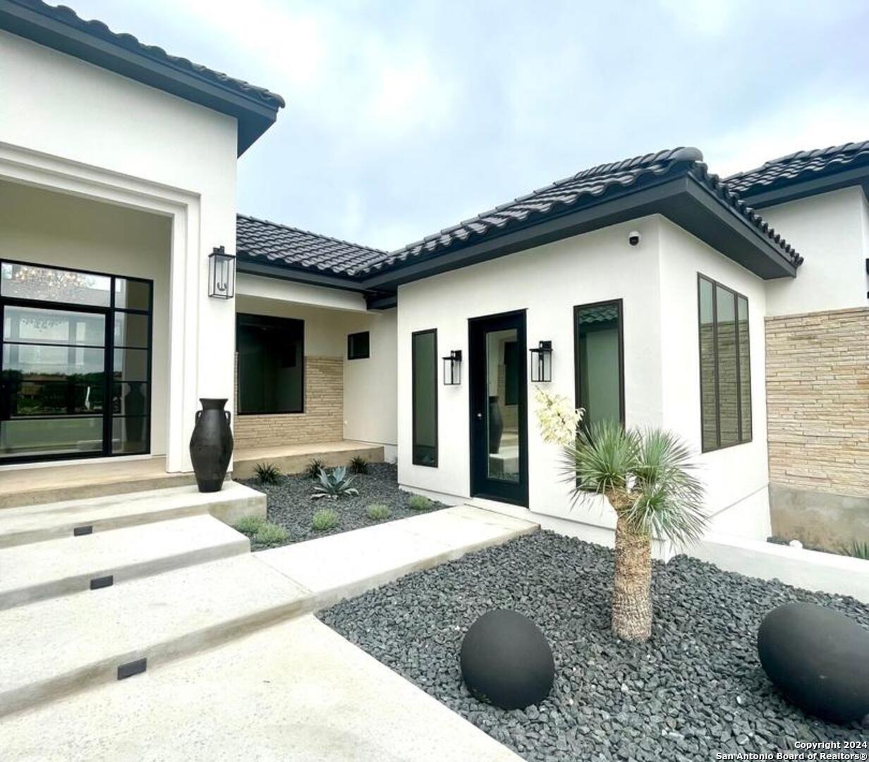 a house view with a outdoor space