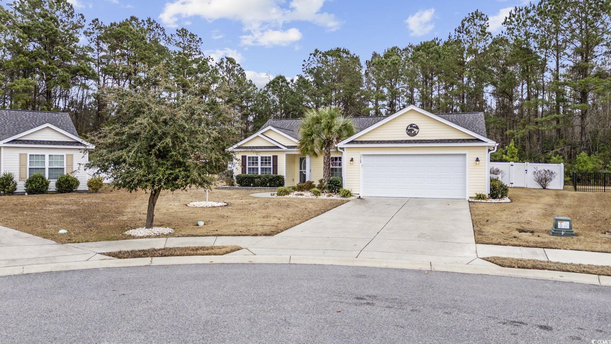 Ranch-style home with a garage