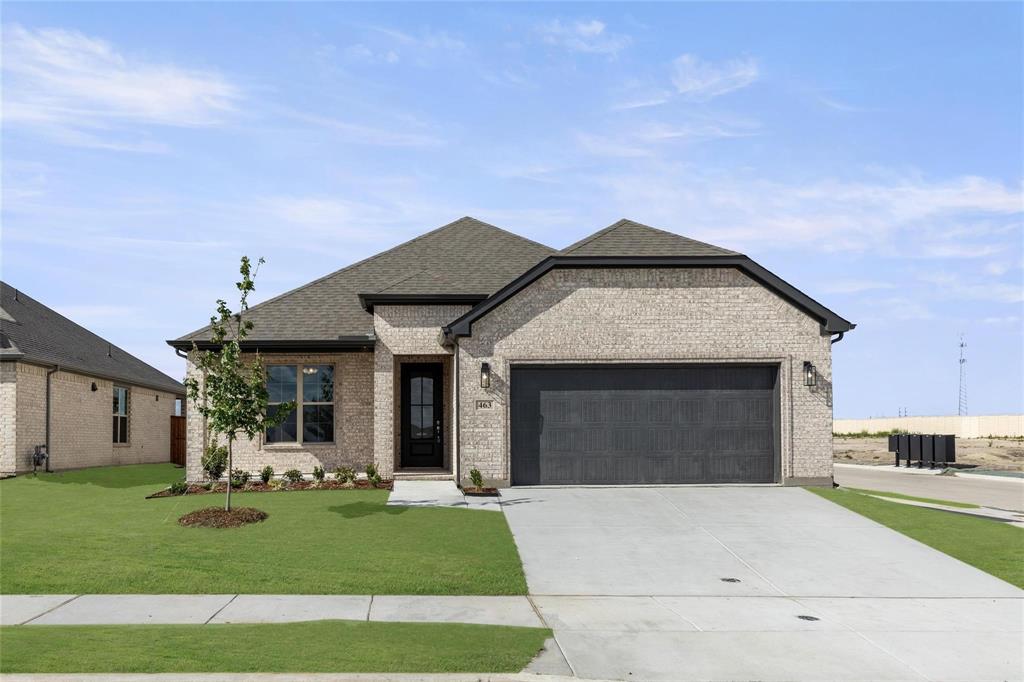 a front view of house with yard