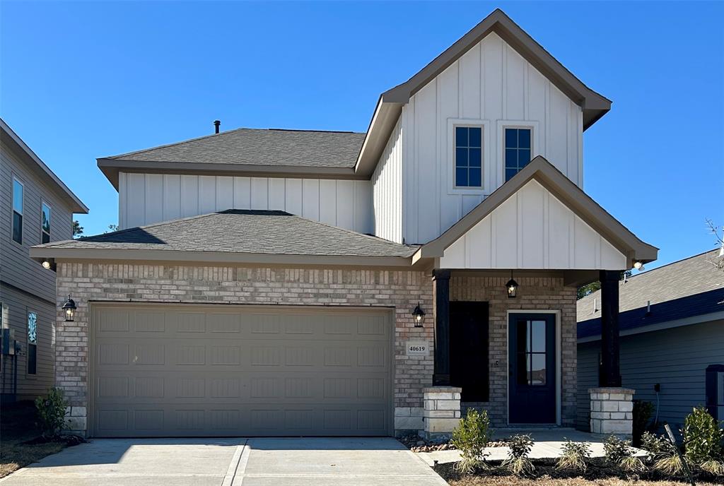 a front view of a house with yard