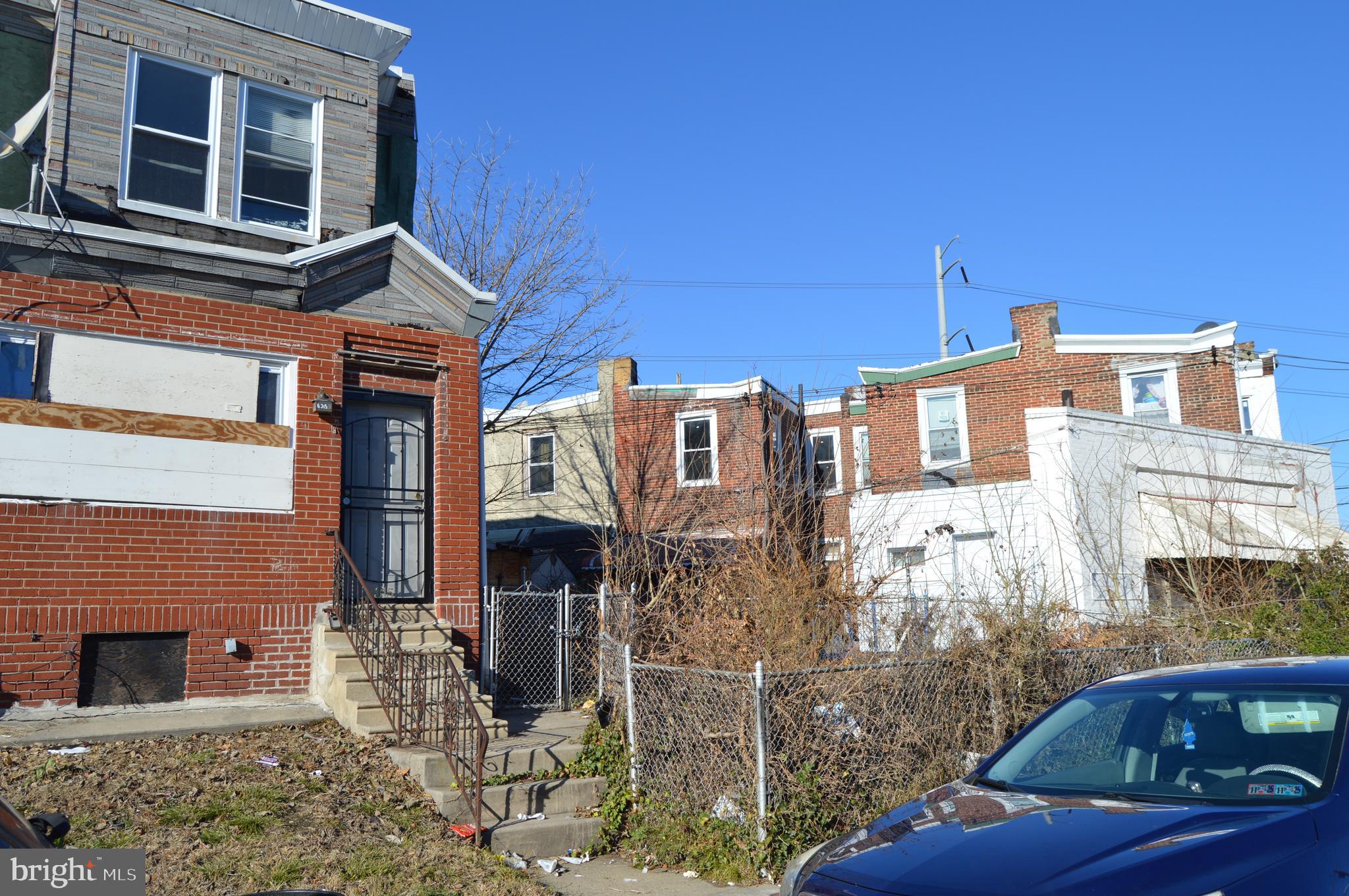 a view of a house with a street