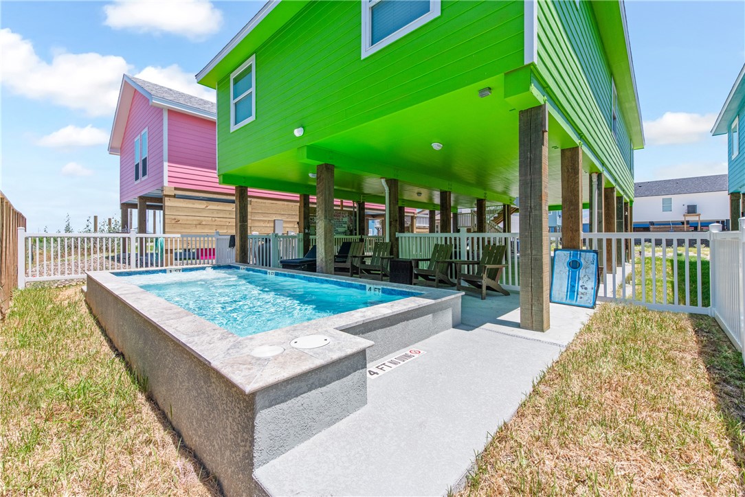 a view of a house with a swimming pool