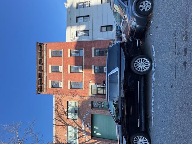 a car parked in front of a house