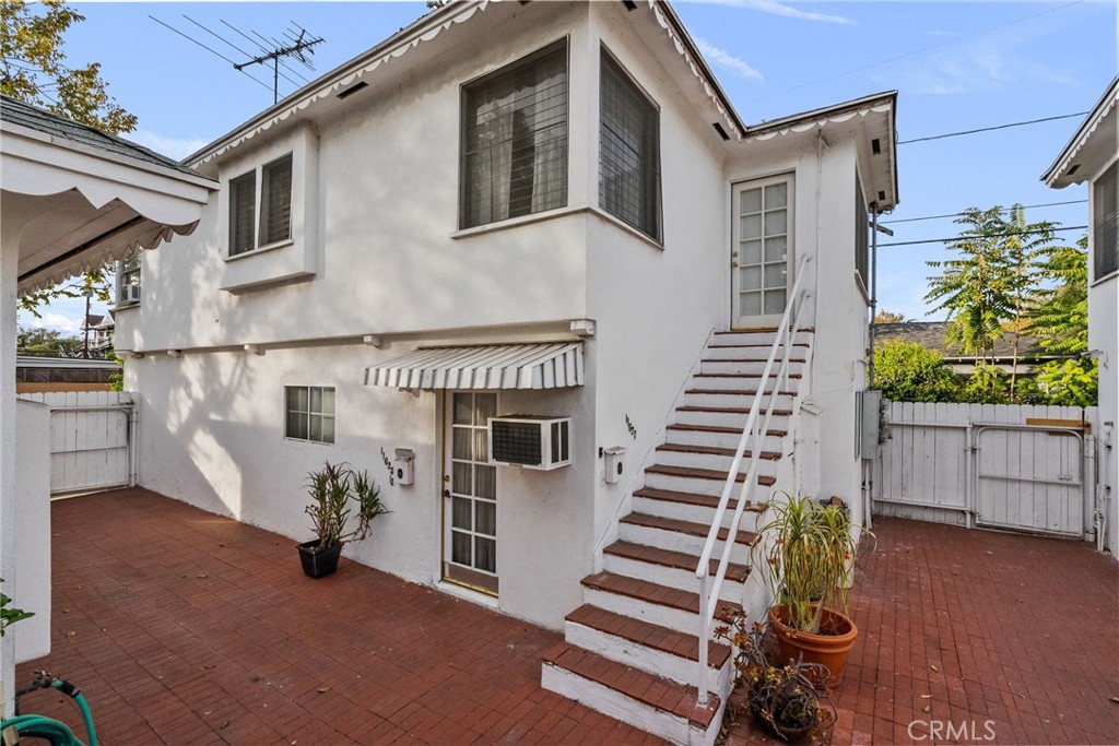 a front view of a house with garage