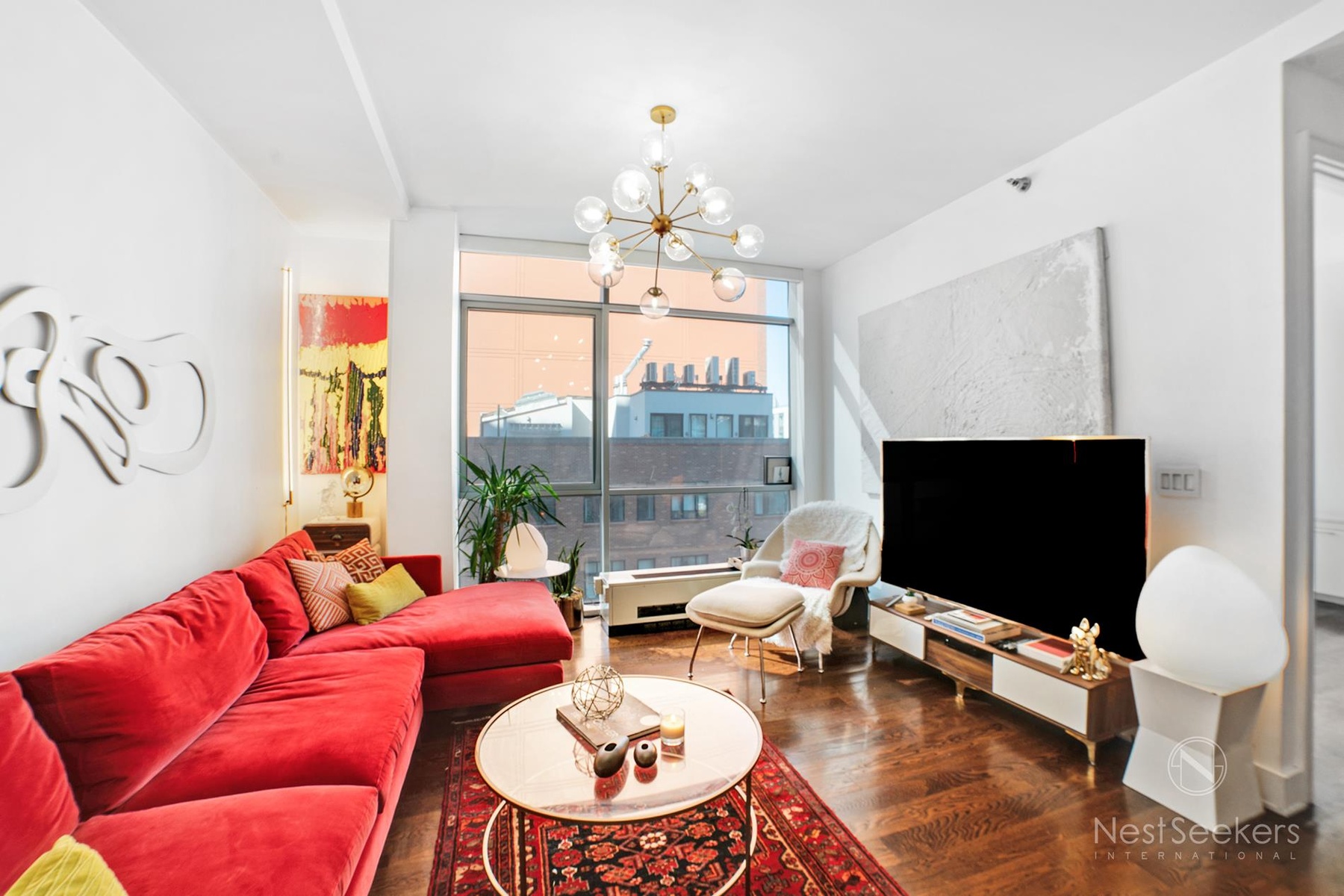 a living room with furniture fireplace and a flat screen tv