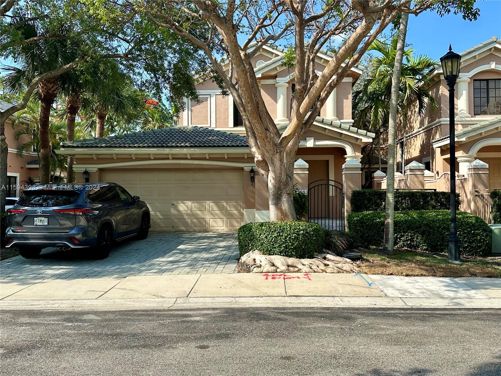 a car parked in front of a house