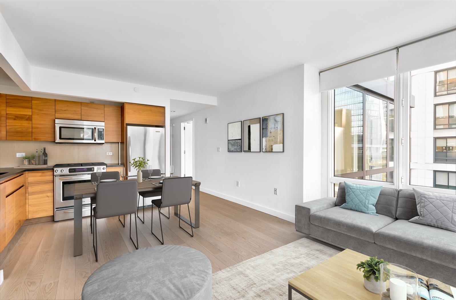 a living room with furniture and a window