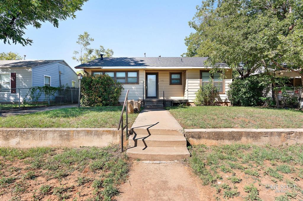 a view of a house with backyard porch and patio