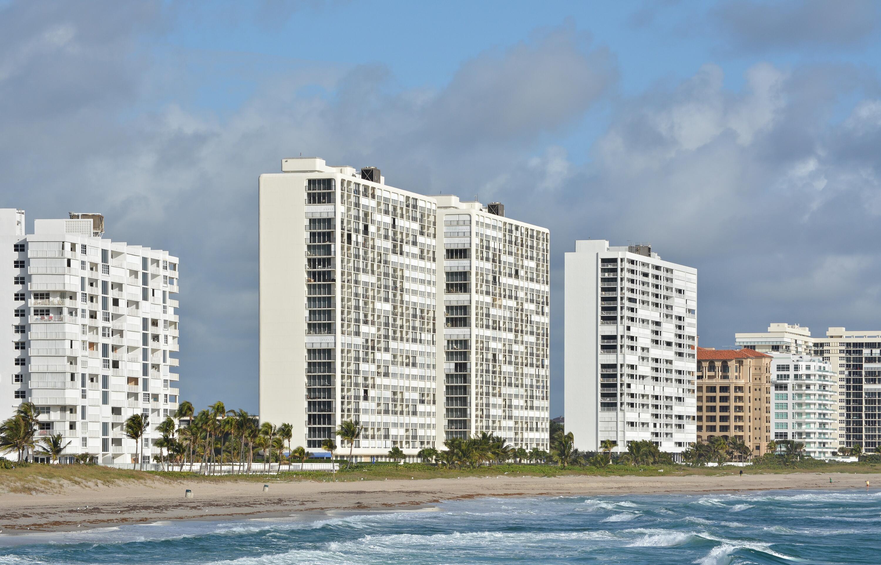 a view of a city with tall buildings