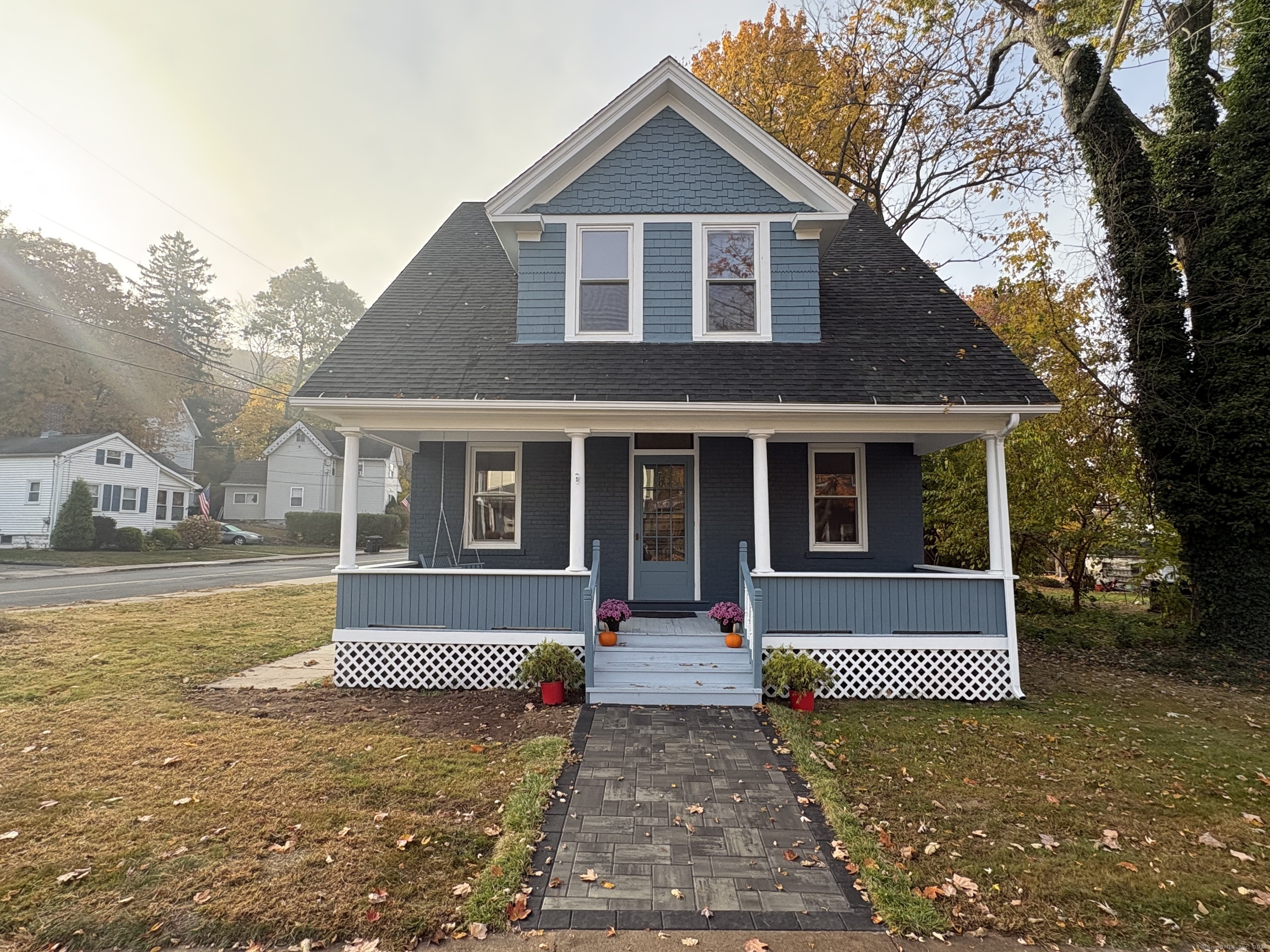 a front view of a house with a yard