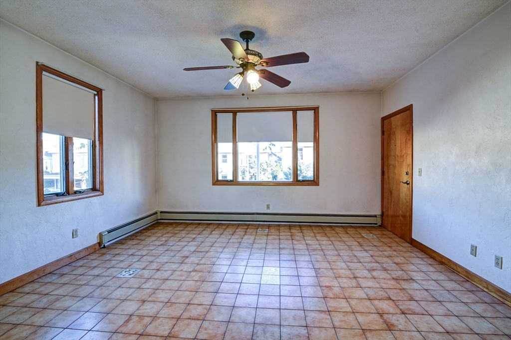 a view of an empty room and window