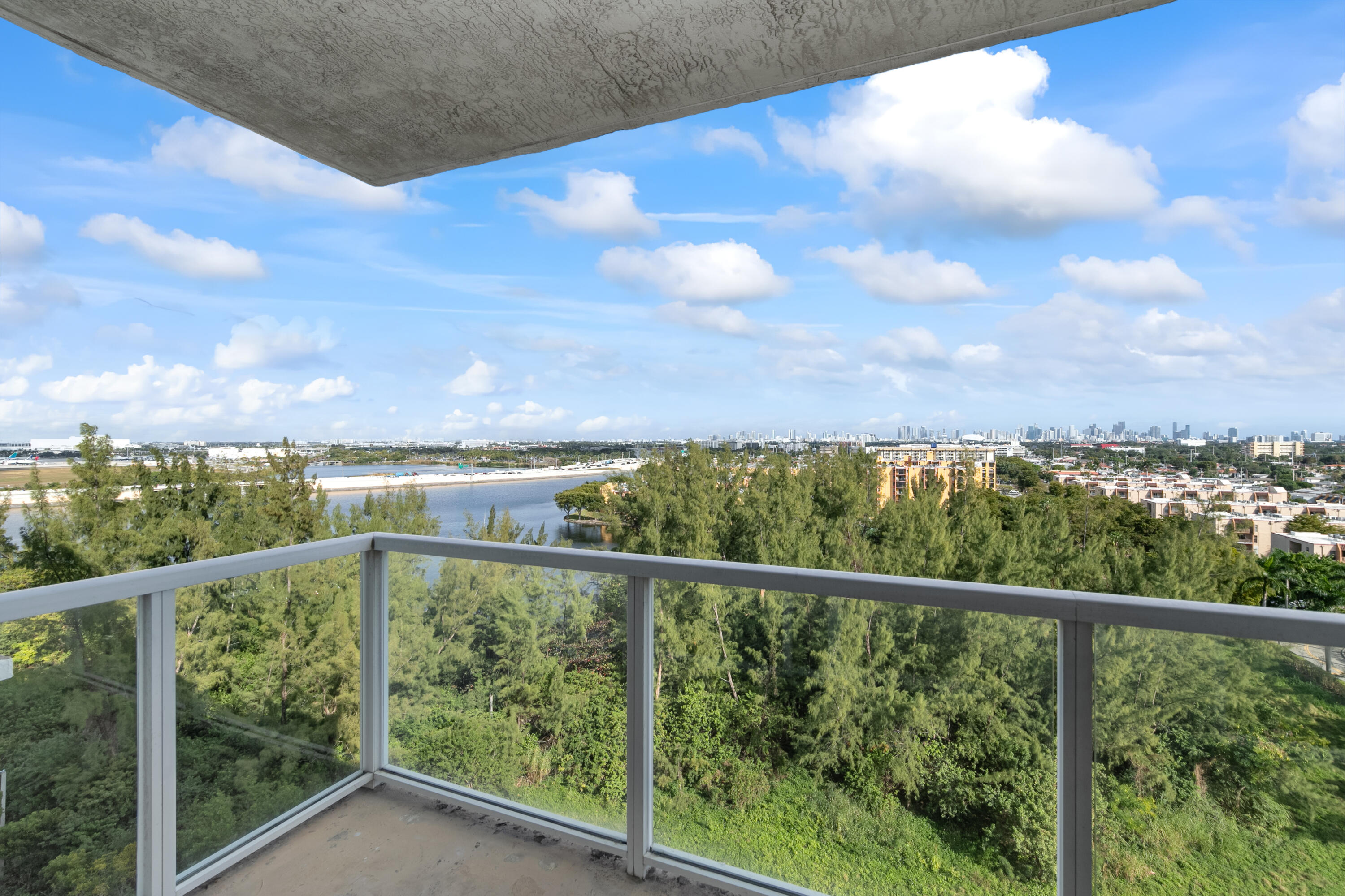 a view of a city skyline from a balcony