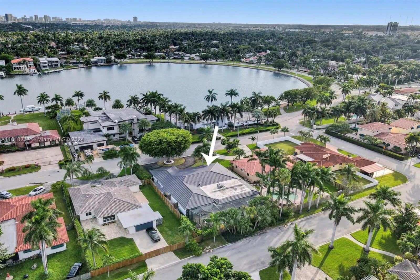 an aerial view of a city with lake view