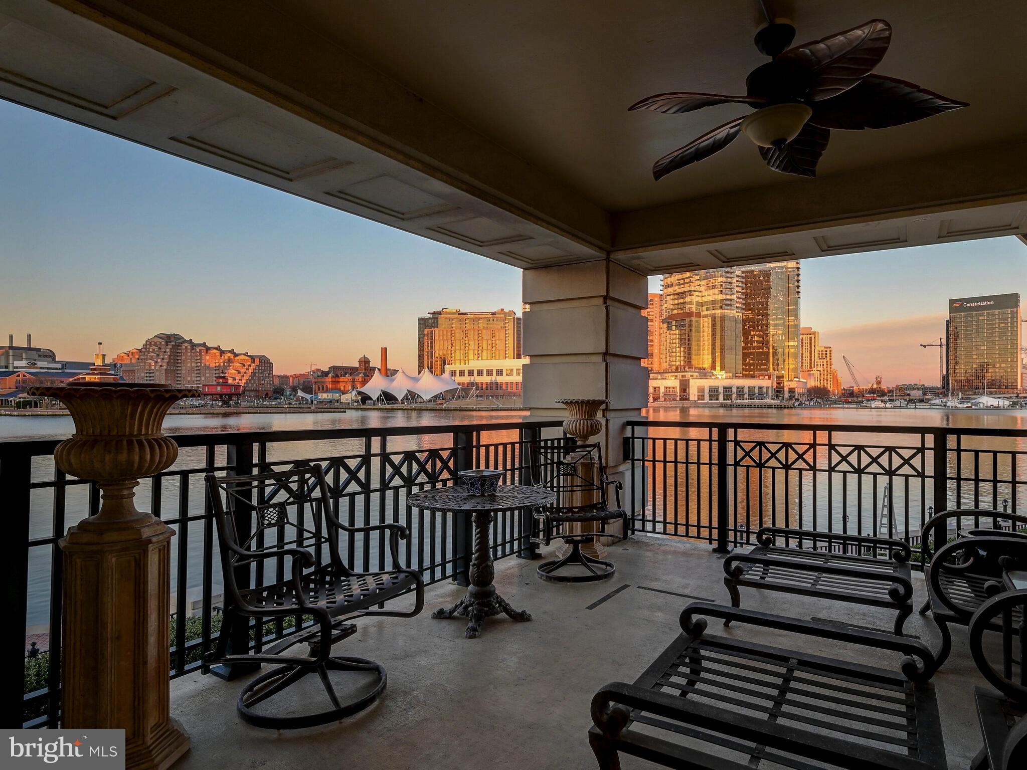 a view of a balcony with chairs