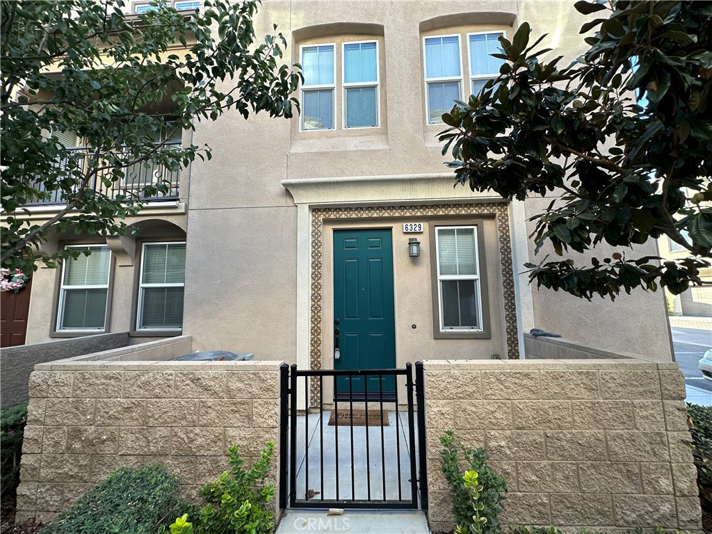 front view of a house with a small yard