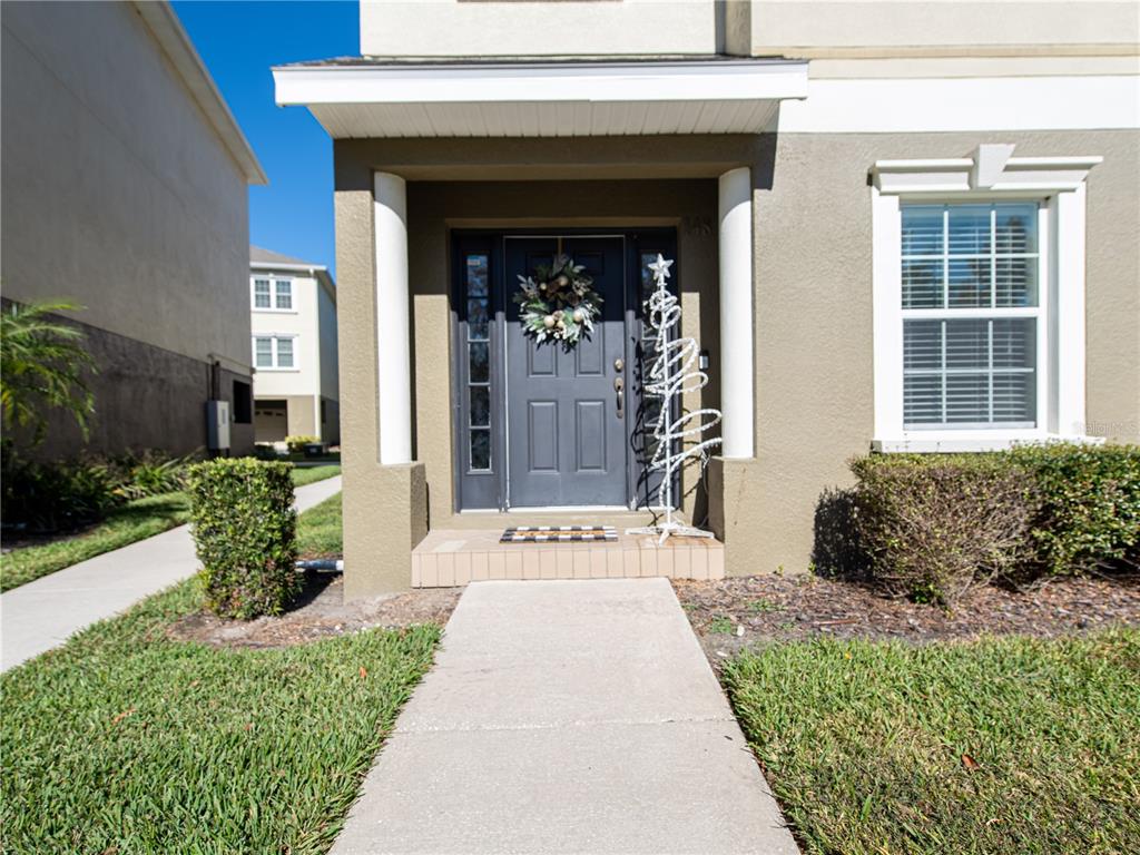 a front view of a house with a porch