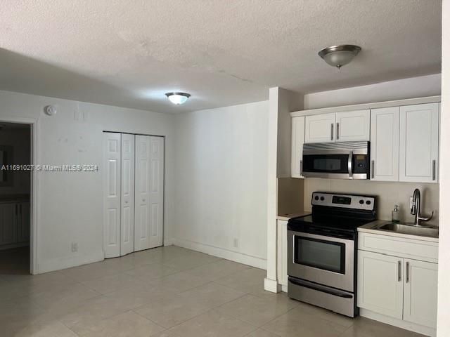 $1,700 | 10701 Cleary Boulevard, Unit 103 | Jacaranda