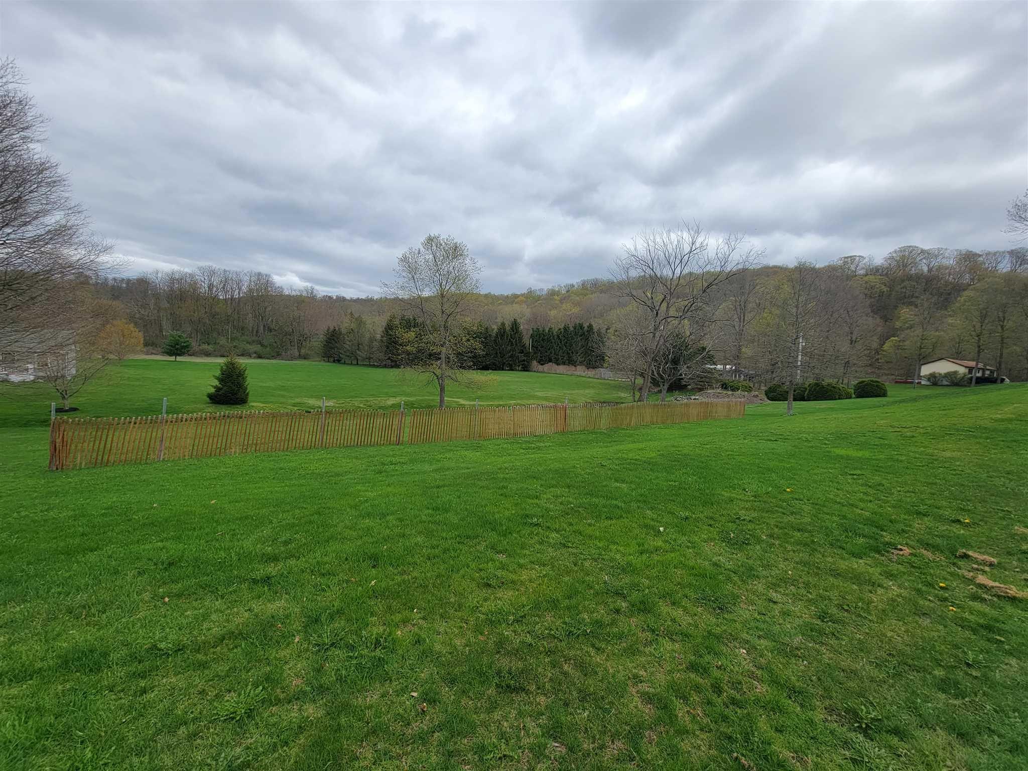 a view of an outdoor space and a yard