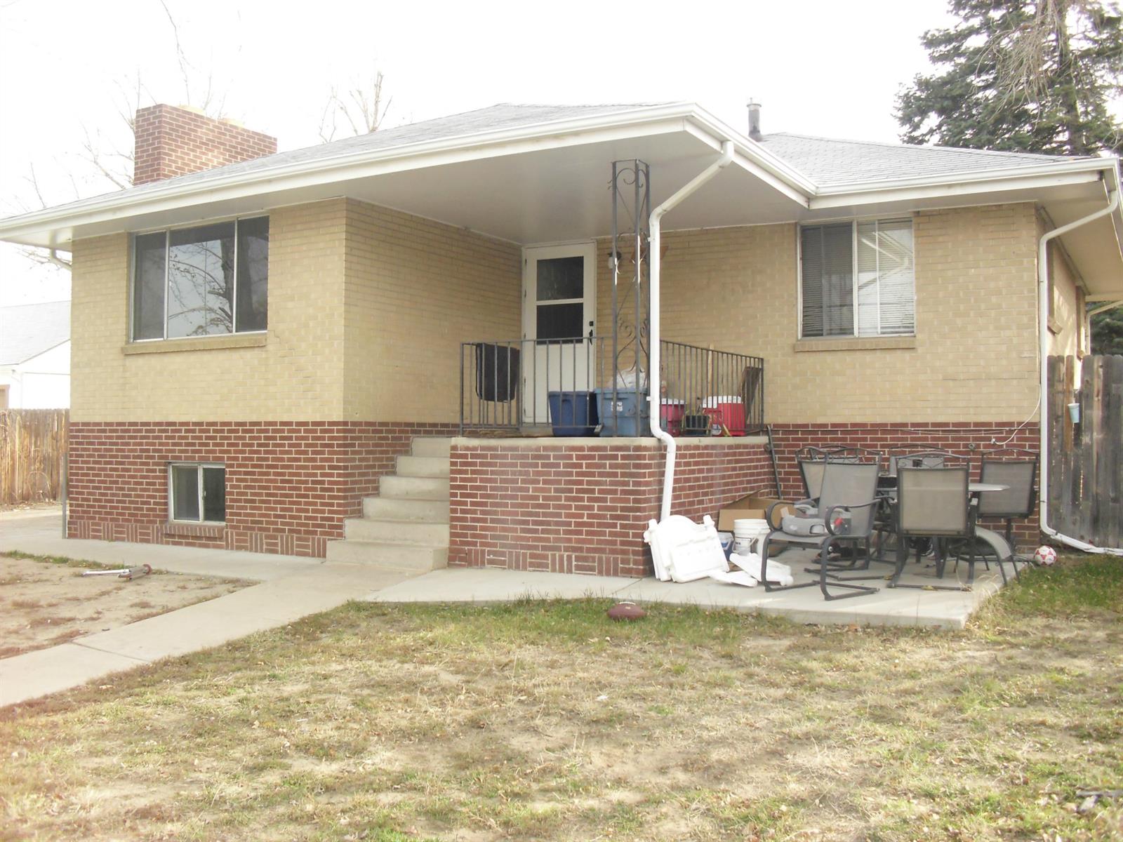 a front view of a house with swimming pool