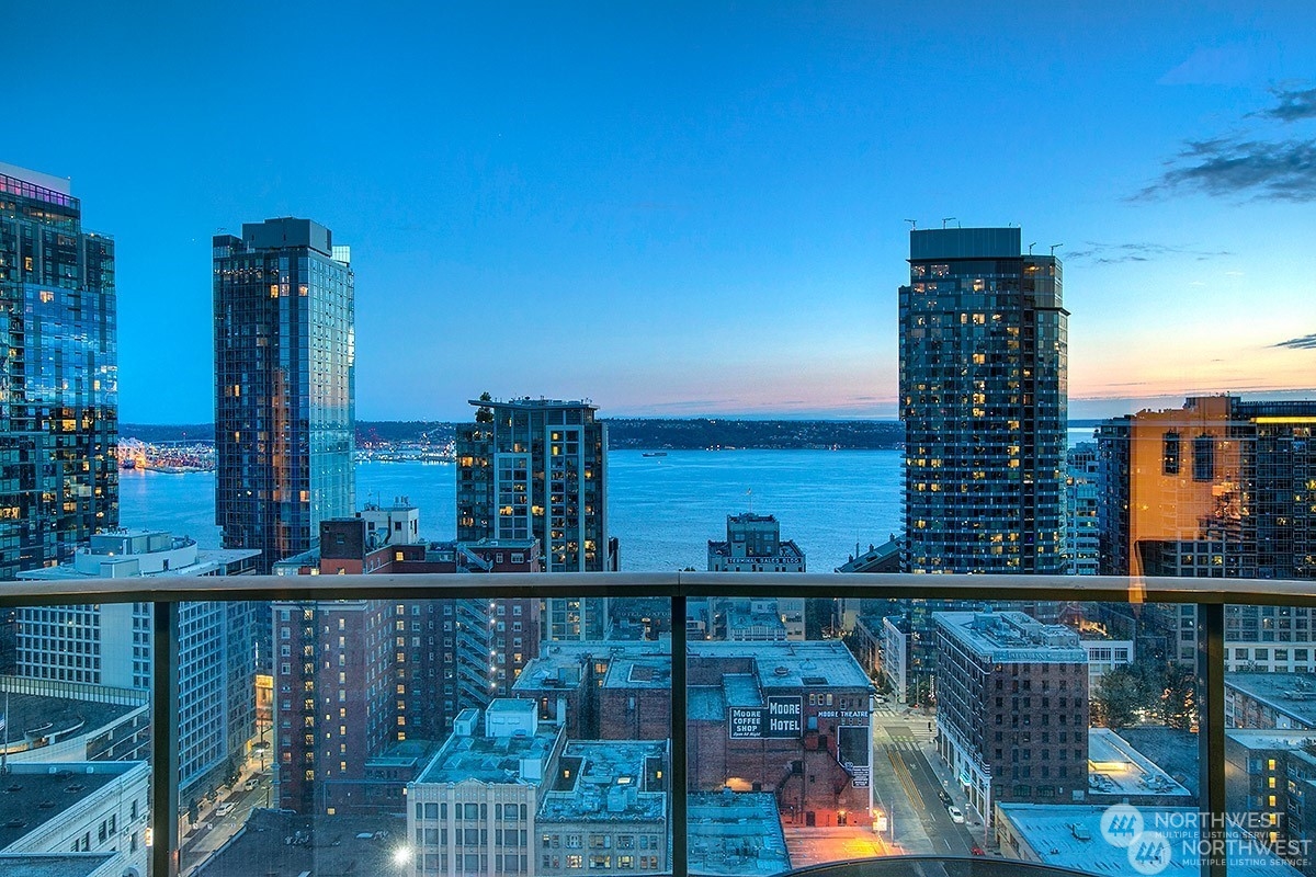 a view of a balcony with city view