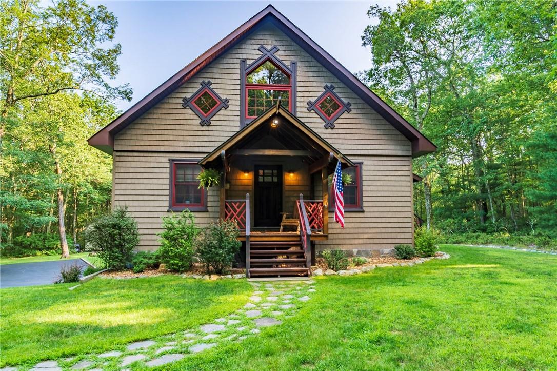 View of front of home with a front lawn