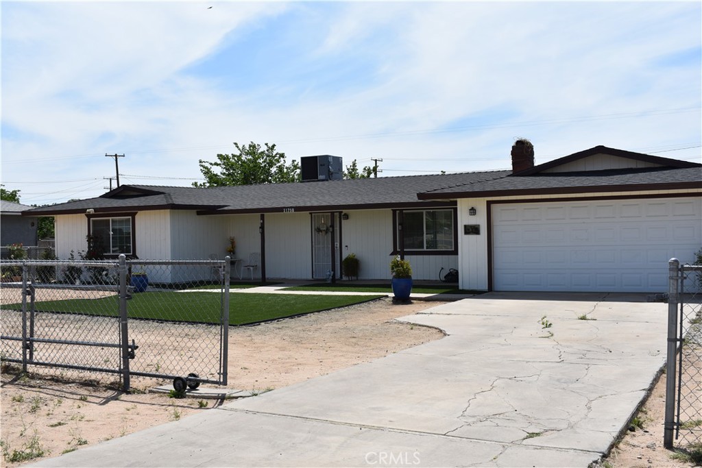 a house with yard in front of it