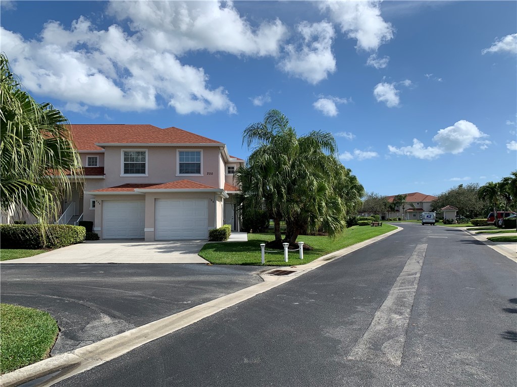 a view of road with house in background