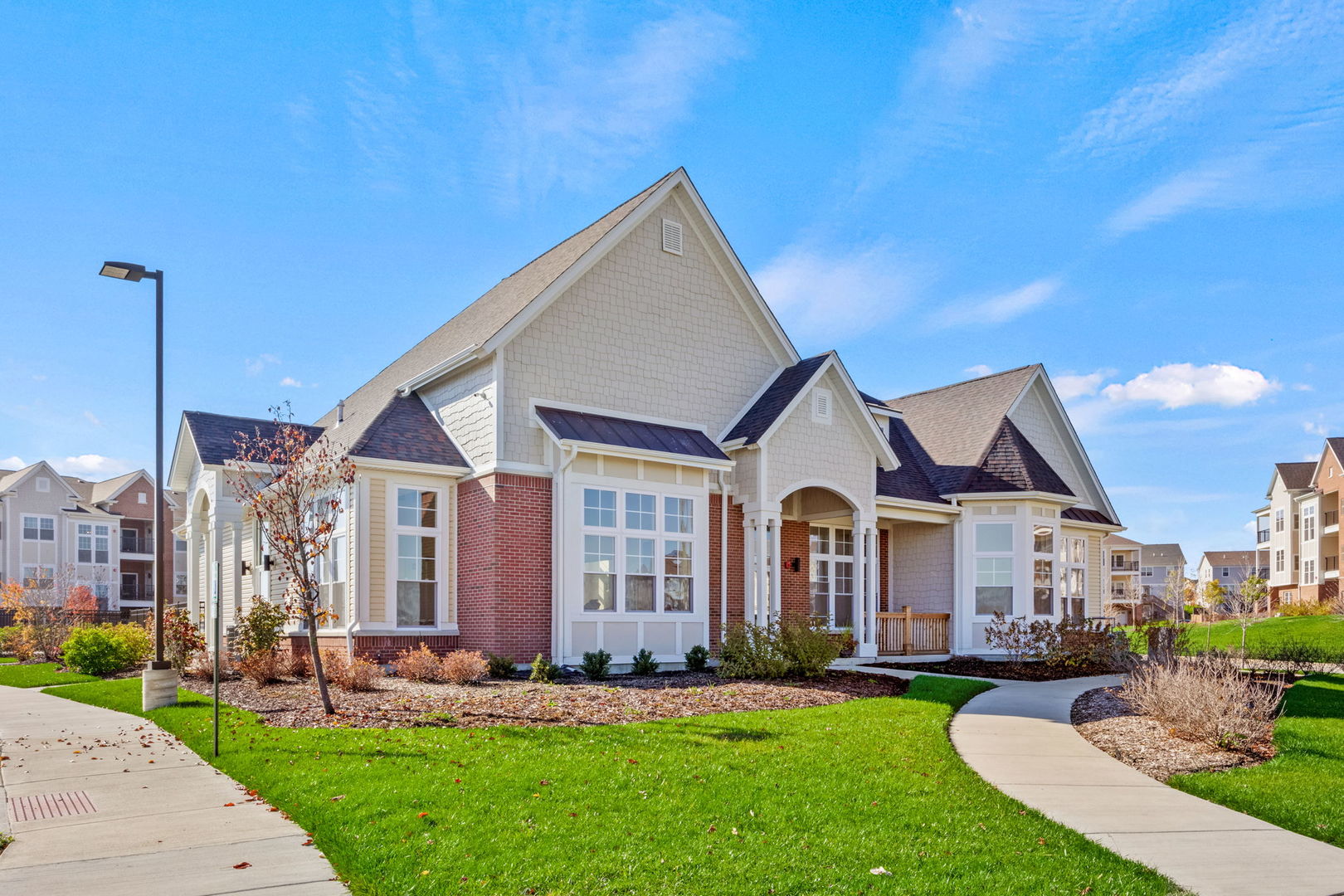 a front view of a house with a yard