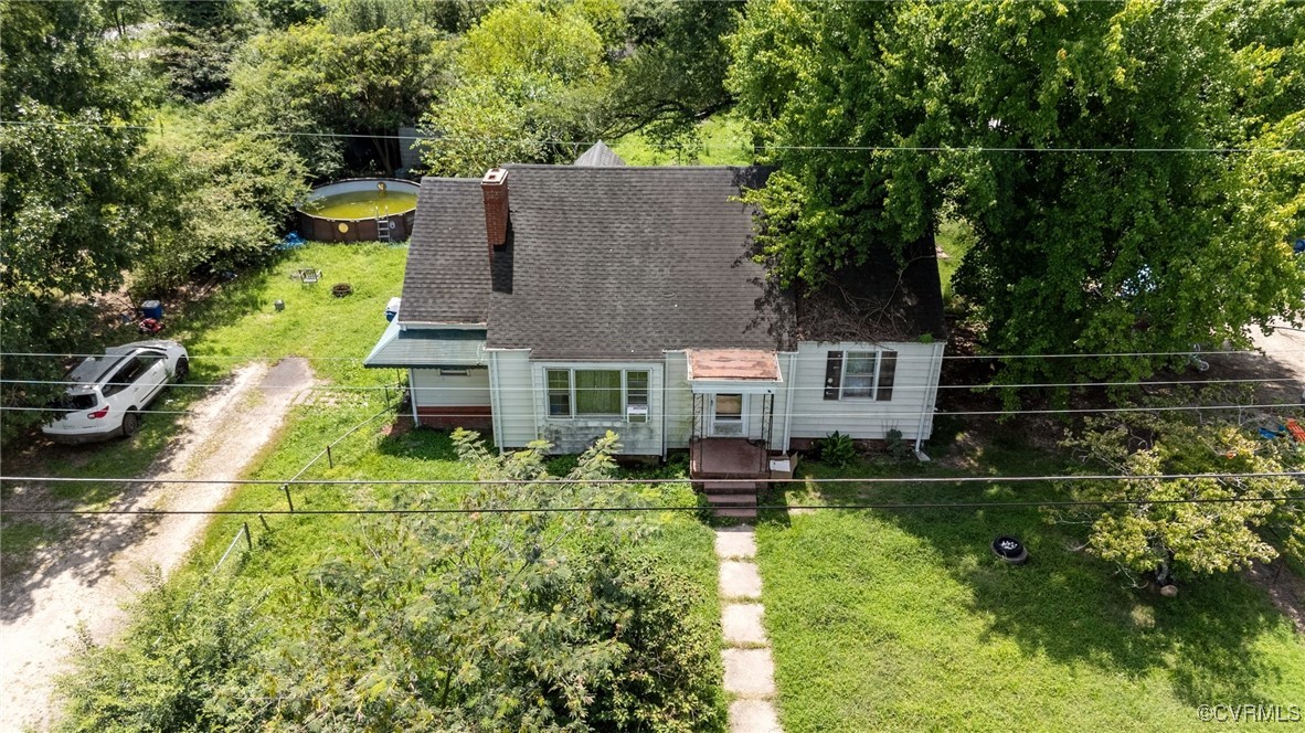 a aerial view of a house with garden