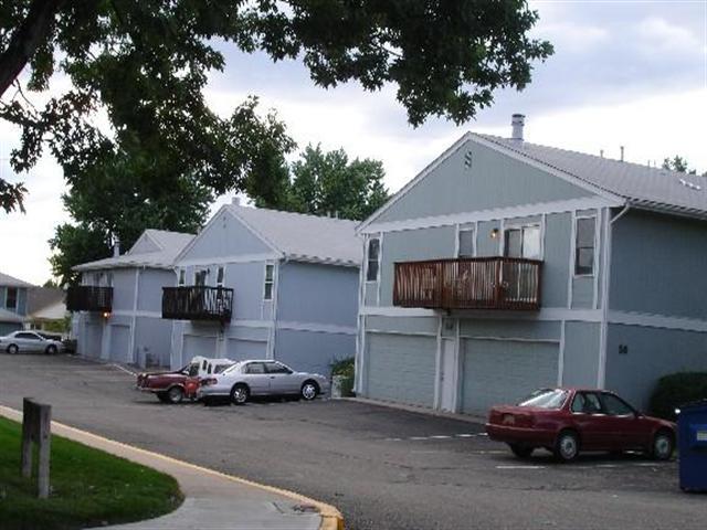 a car parked in front of a house