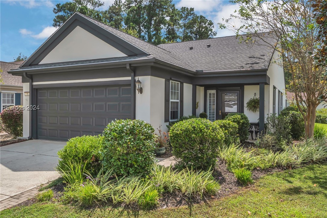 Single story home with a garage