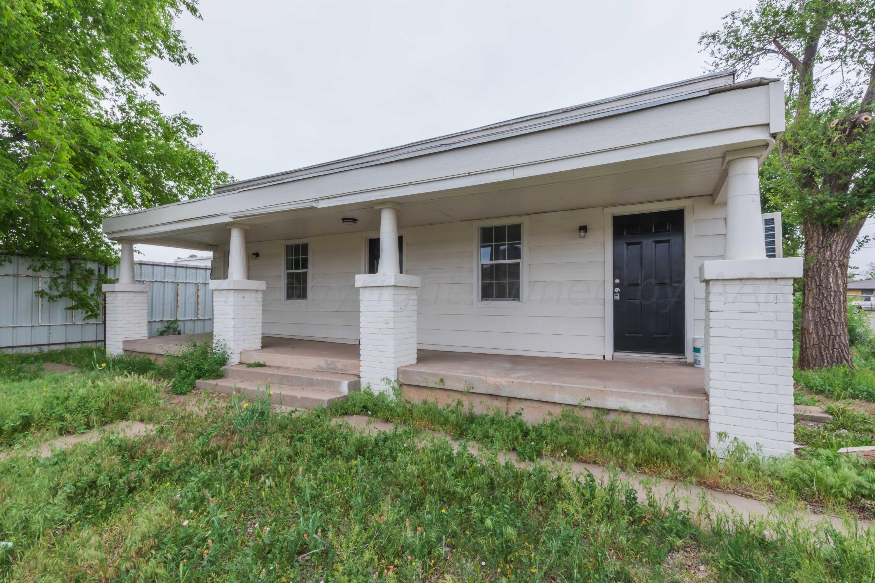 a front view of house with yard