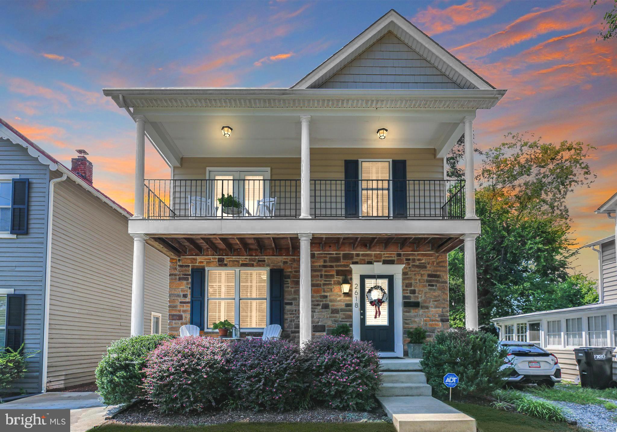 front view of a house with a yard