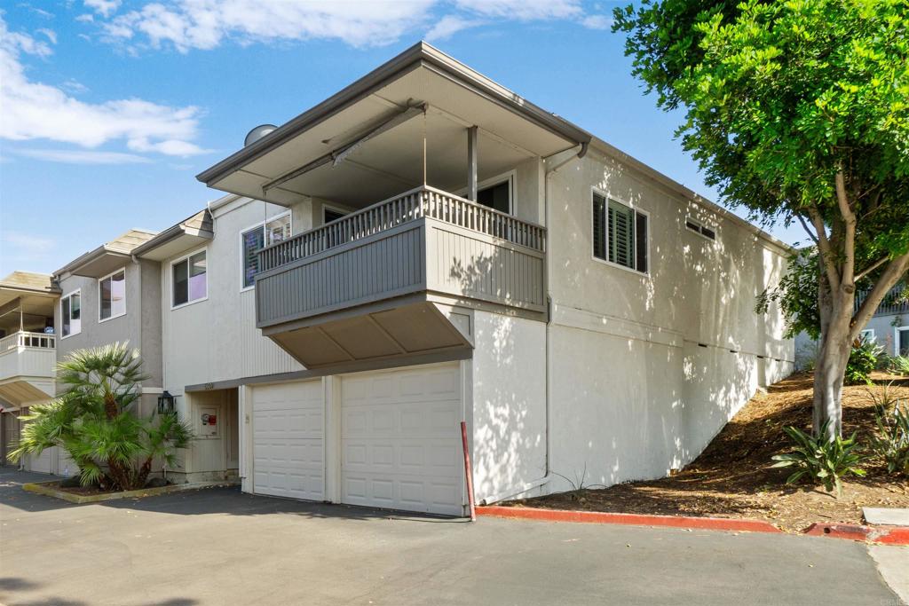 a view of a house with a garage