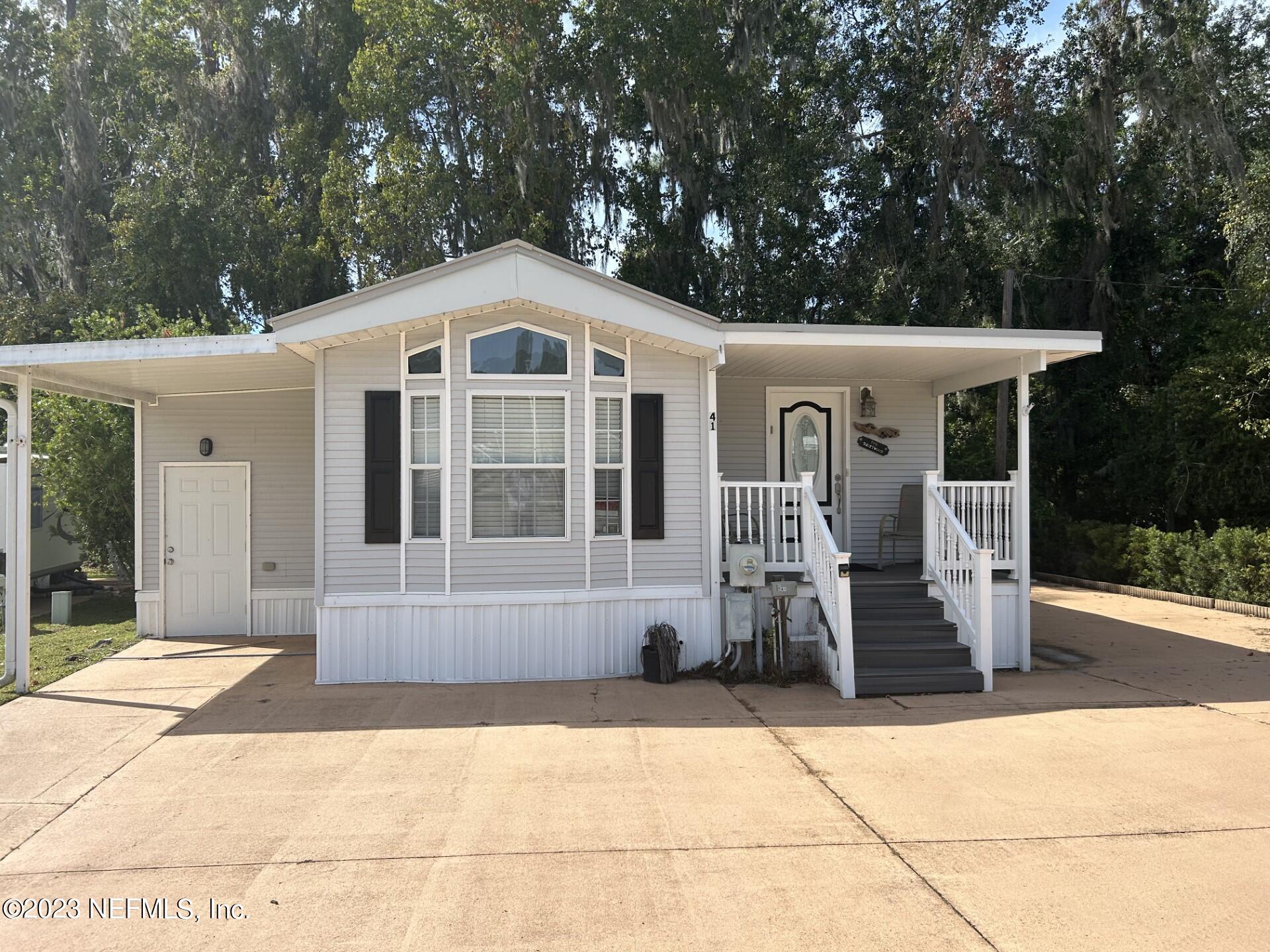 a front view of a house with porch